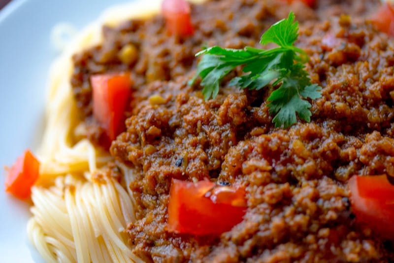 Spaghetti with rich meat sauce and marinara
